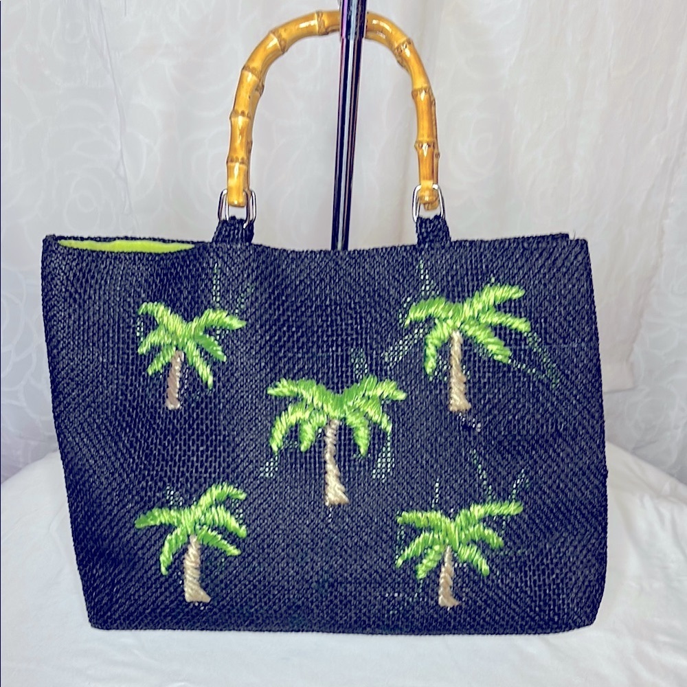 VIKTORIA HAYMAN dark blue woven palm tree embroidered tote. Bamboo handles.